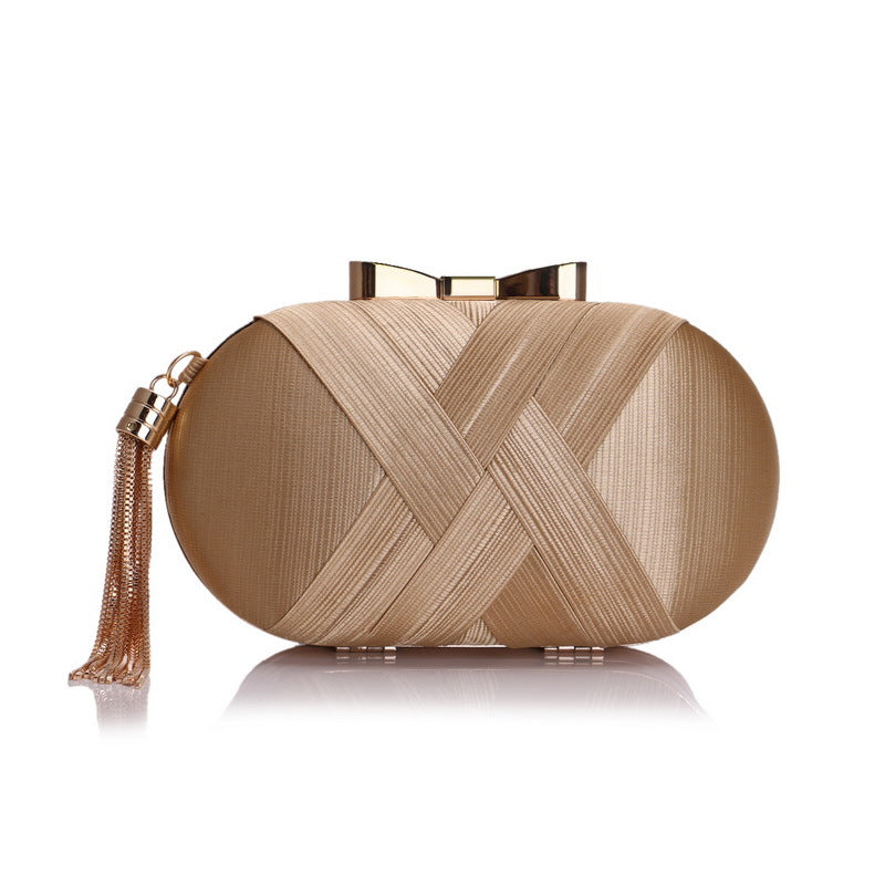 The Silk Tasseled Clutch