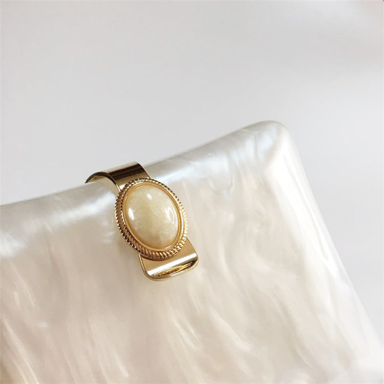 The Mother Of Pearl Clutch