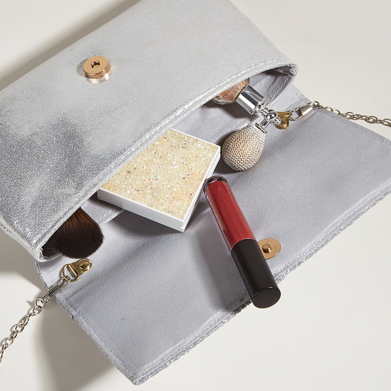 The Pleated Shiny Clutch