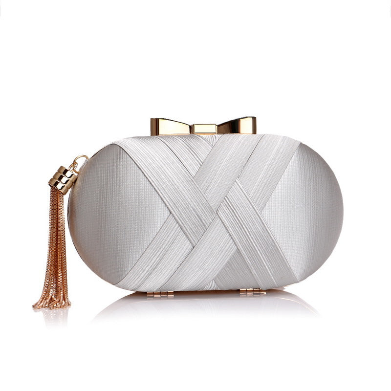 The Silk Tasseled Clutch
