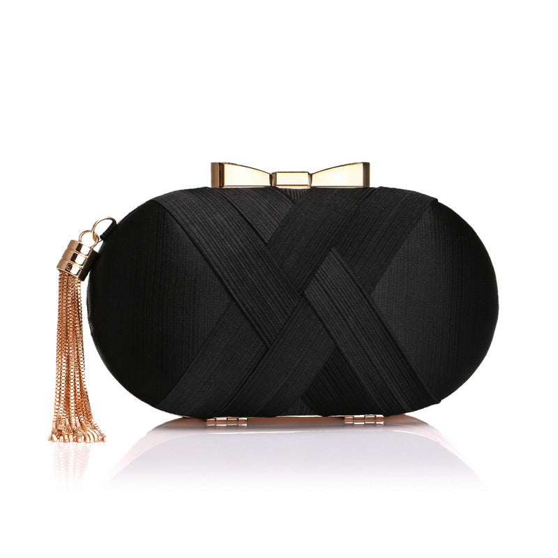 The Silk Tasseled Clutch